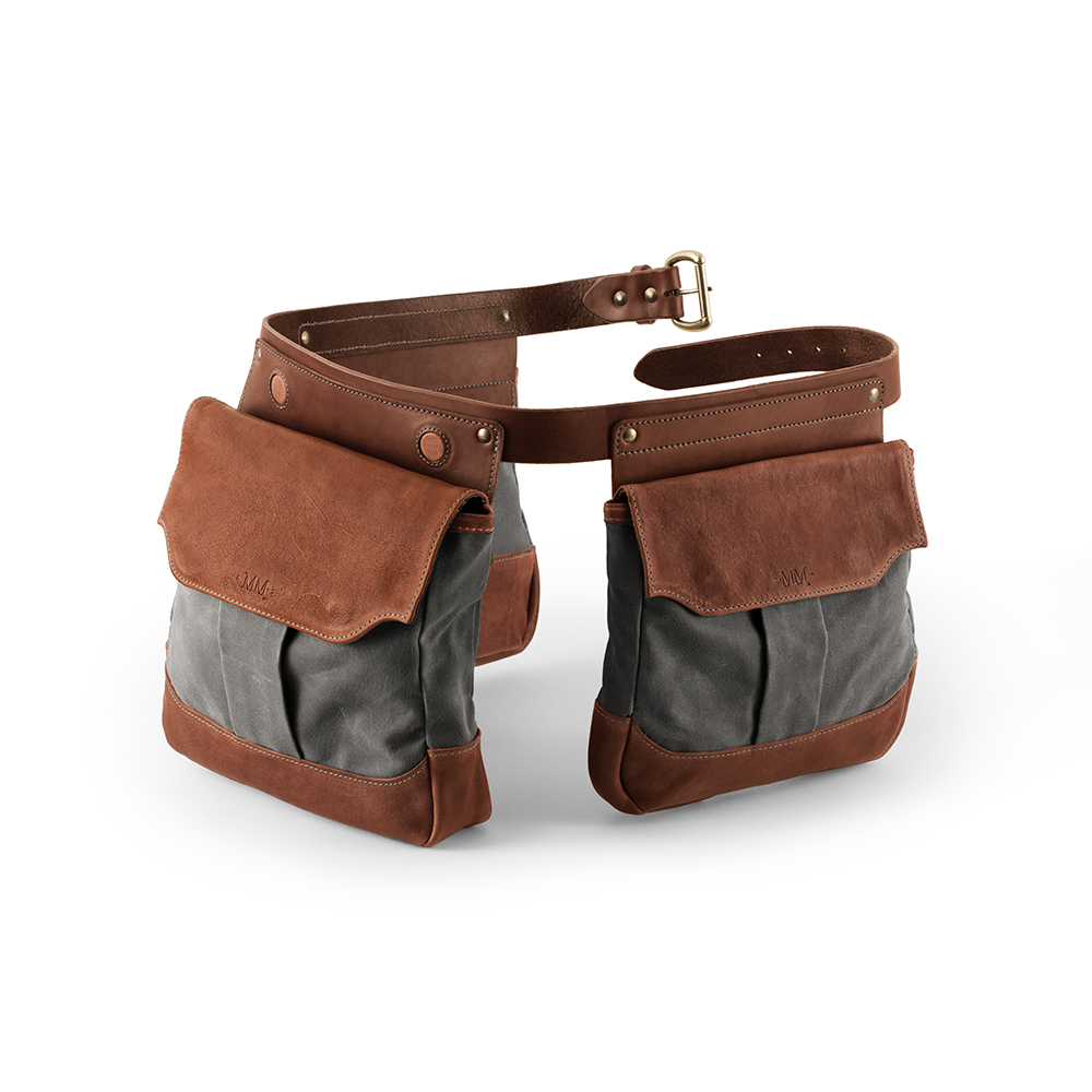 The sturdy Bird Bag Trio belt has two side bags for shotgun shells (live and spent, respectively), and a larger, back bag designed to hold your harvested birds. The bags have magnetic closures, opened by mere fingertip pressure. Corresponding magnet catches along the belt hold open the flaps. The three belt bags are pleated for overstuffing, while the game bag has a reversible inner lining for easy cleaning.