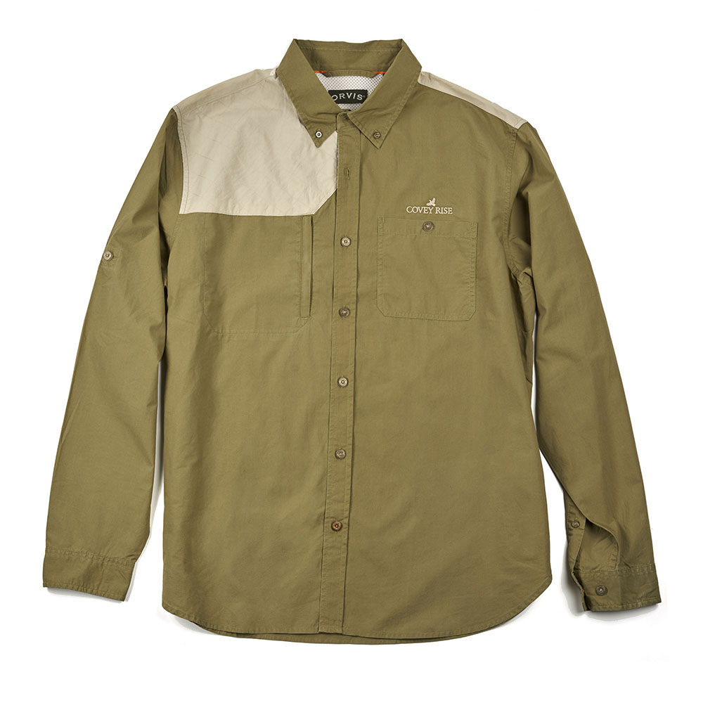 on't let hot weather get in the way of a great day of hunting. This light, airy shirt made by Orvis will help fight that clammy feeling and regulate your temperature. The featherweight cotton is soft and breathable yet constructed to stand up to seasons of use. The fit allows mobility and mesh inserts help ventilate. Quilted shoulder shooting patch with low-profile, secure zip chest pocket. Back pleat allows unrestricted swing. Roll-up sleeve tabs. Pure cotton. Washable. Imported. Covey Rise embroidered logo on left chest.