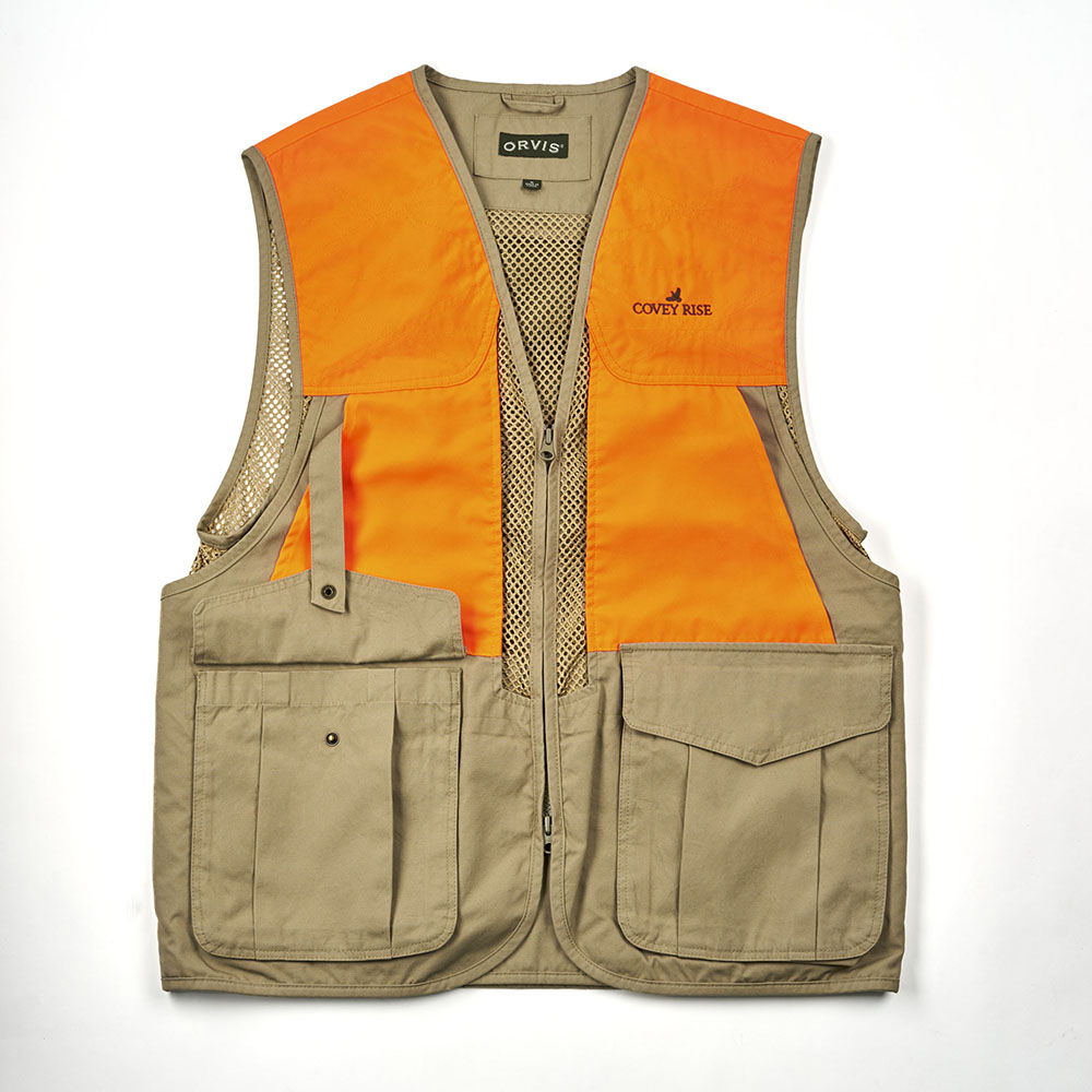 These Orvis mesh constructed vest keeps the air flowing and keeps you cool. Full front-loading with large, rear easy-to-clean, blood-proof game pocket. Front pockets for shells, knives, and anything else. Carry your gear, lose the heat. Imported. Covey Rise embroidered logo on left chest.